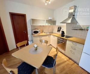 TÁLE - INVESTIČÝ 2-izbový byt. GOLF, LYŽOVANIE